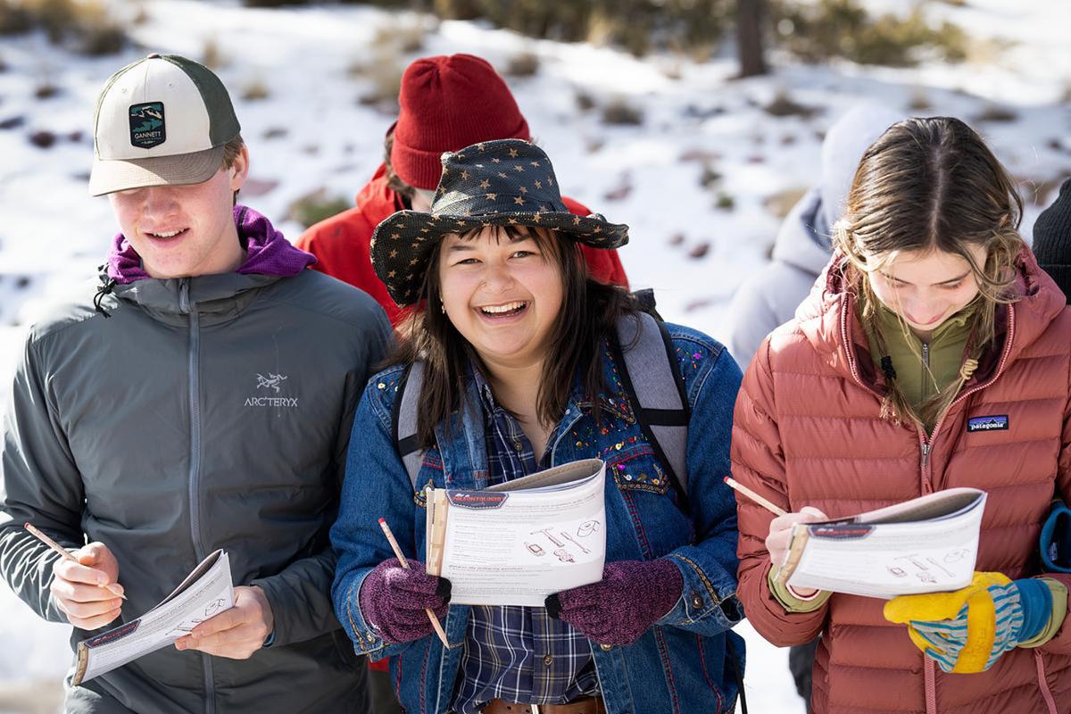Dore Young, center, leads a WSO Priddy Experience first year group explores the Florissant Fossil Beds in the Rocky Mountain Southwest on 1/27/23. Photo by Lonnie Timmons III / Colorado College.